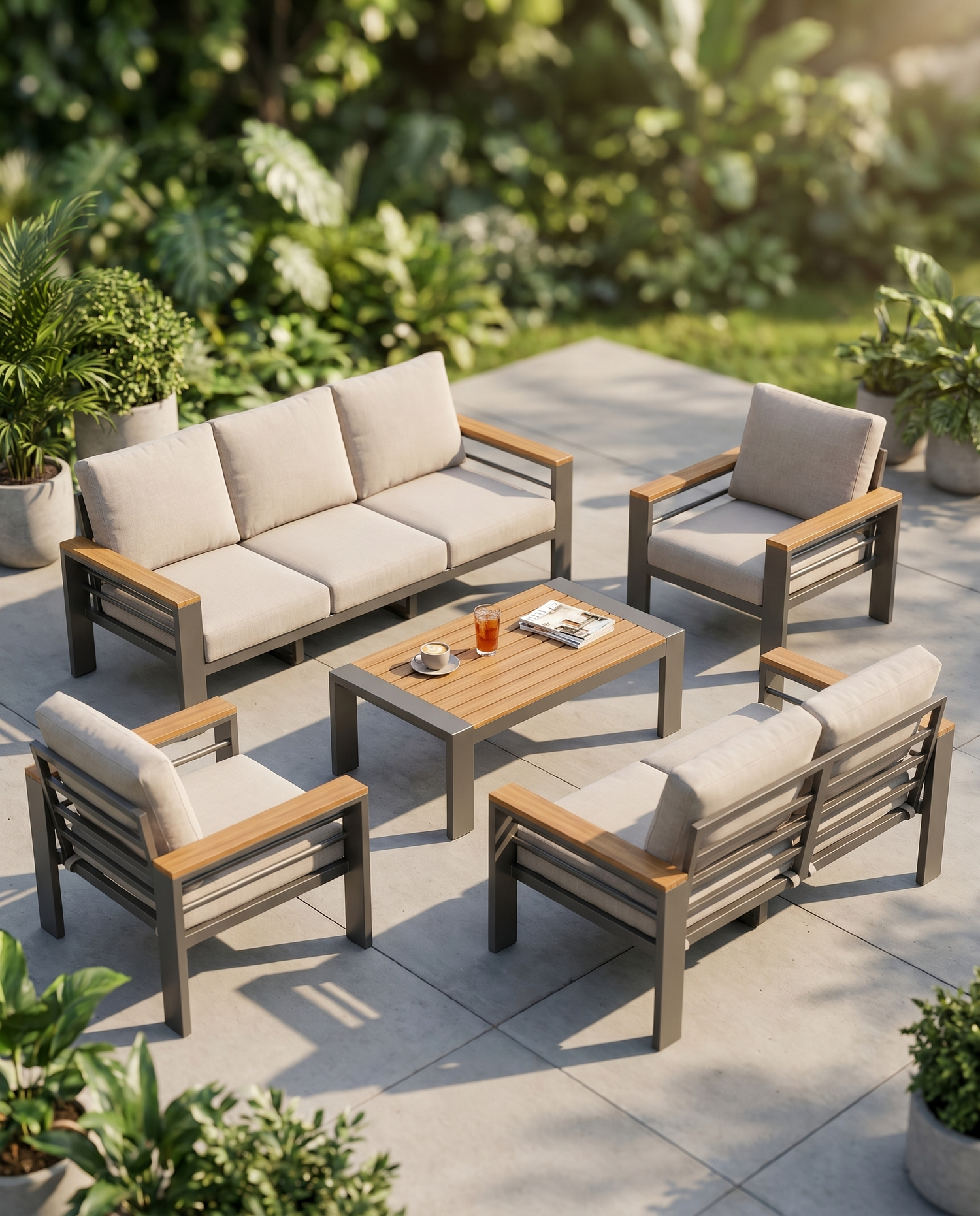 Aluminium patio furniture set with beige cushions on a sunny garden patio