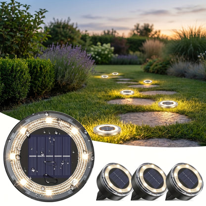 Round in-ground solar lights along a steppingstone path at dusk, square