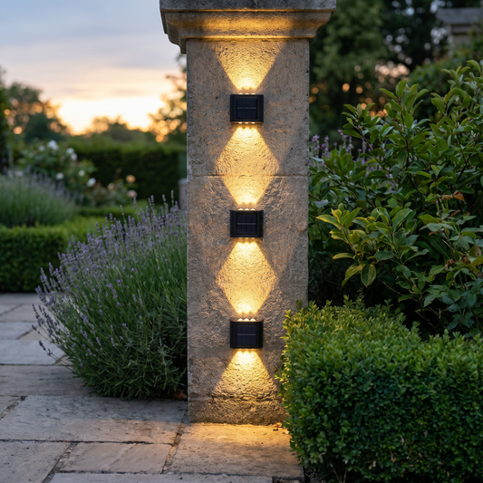Solar up/down wall sconces on a stone pillar at dusk, square