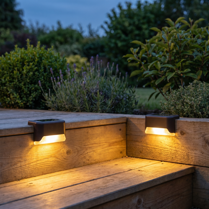 Solar step lights glowing on wooden deck steps at dusk, square