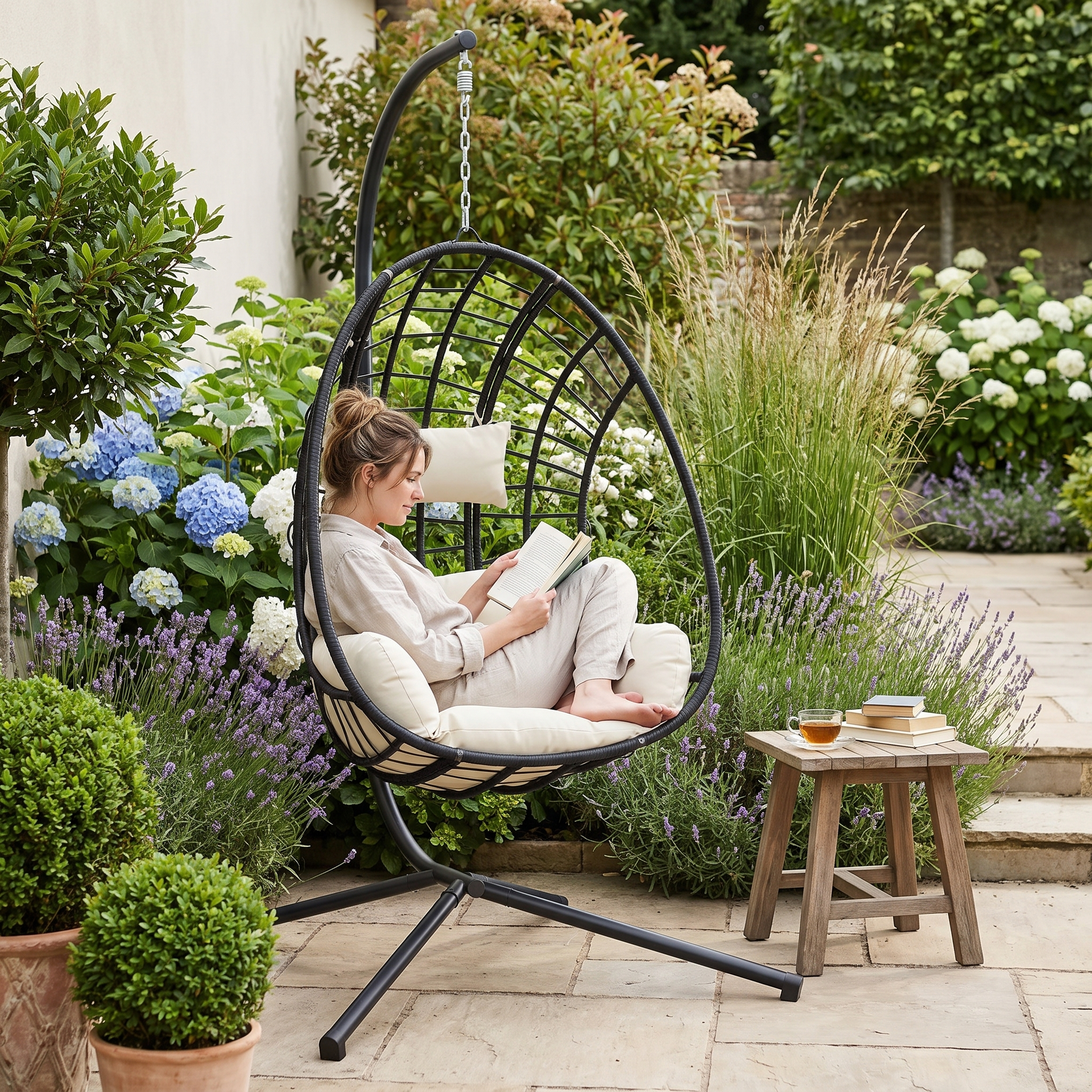Rattan hanging egg chair with stand lifestyle