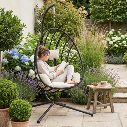 Rattan hanging egg chair with stand lifestyle