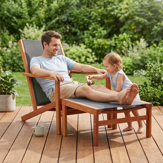 Dad and toddler with eucalyptus lounge chair on deck
