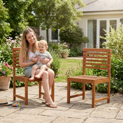 Mum and toddler on acacia wood garden chairs